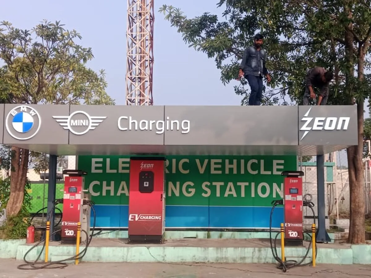 BMW MINI branded charging hub with two DC fast chargers at a drive-through restaurant